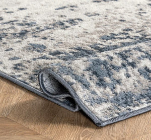 7'8" x 9'10" Zoe Faded Abstract Area Rug