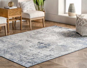 7'8" x 9'10" Zoe Faded Abstract Area Rug